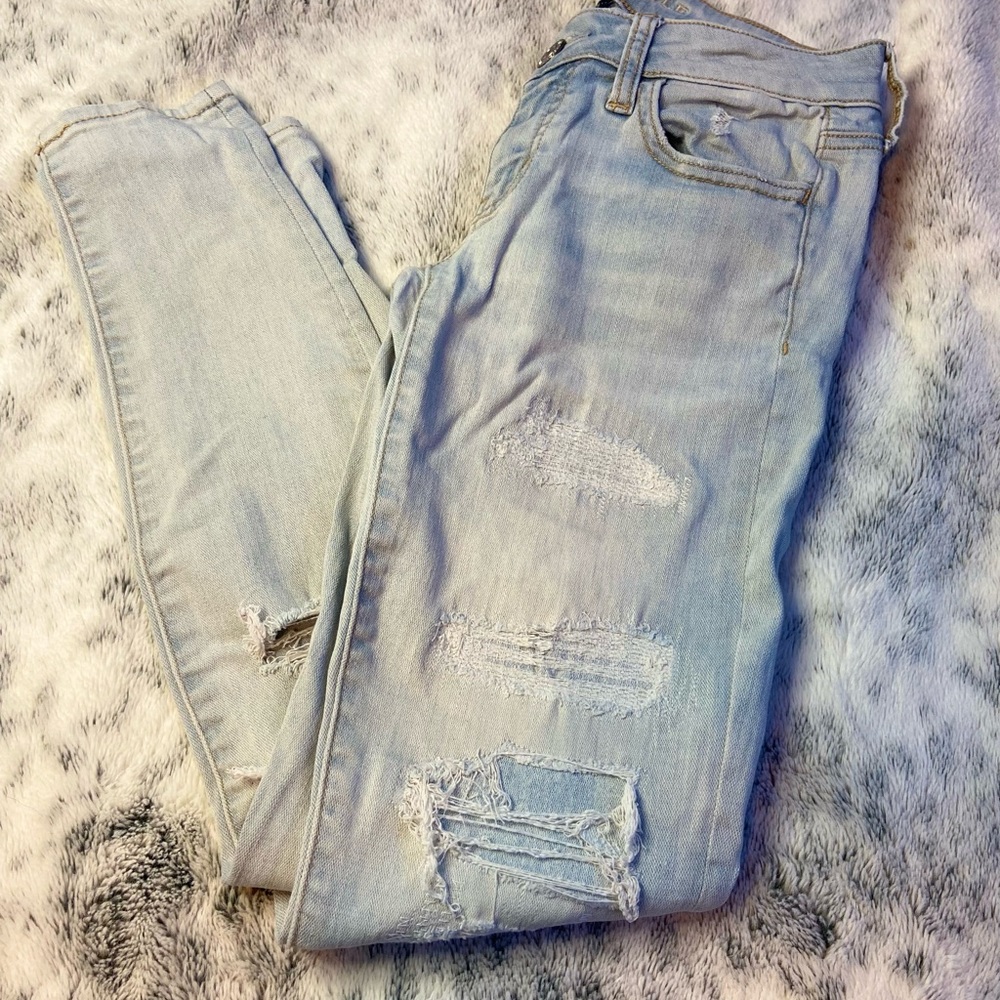 American eagle patched /ripped jeans ,light blue, worn once ,